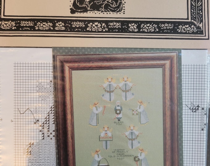 Told In A Garden A Band Of Angels Cross Stitch Pattern. Good Condition. Free Shipping.