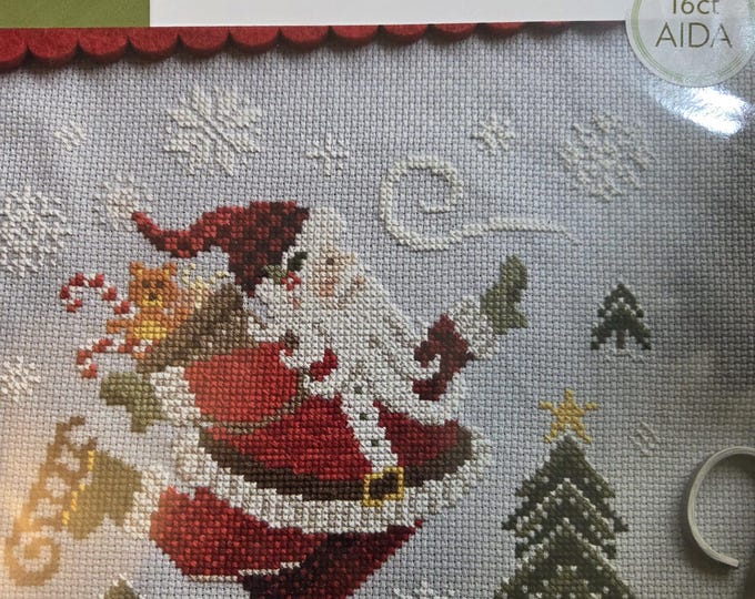 Skating Santa Counted Cross Stitch Kit. FREE SHIPPING. New Condition.