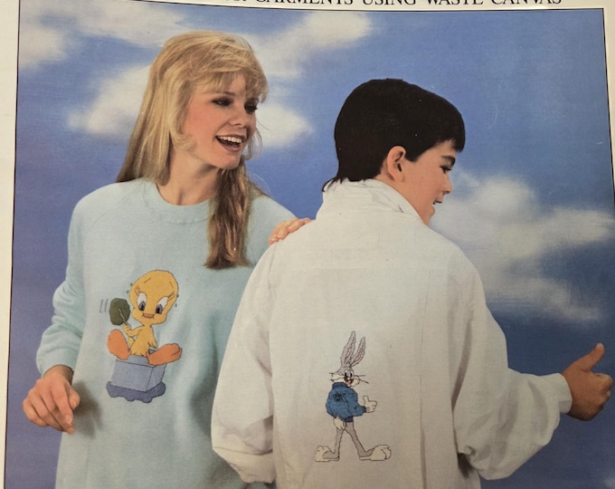 Looney Tunes Sweatshirts Cross Stitch Pattern. FREE SHIPPING. Preowned Used Older Condition. Some writing on inside.