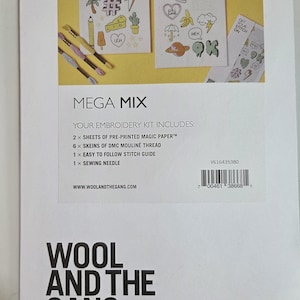 May include: A Wool and the Gang Mega Mix embroidery kit package featuring two sheets of pre-printed magic paper with various small graphic designs, six skeins of DMC mouliné thread, a sewing needle, and a stitch guide on a yellow background.