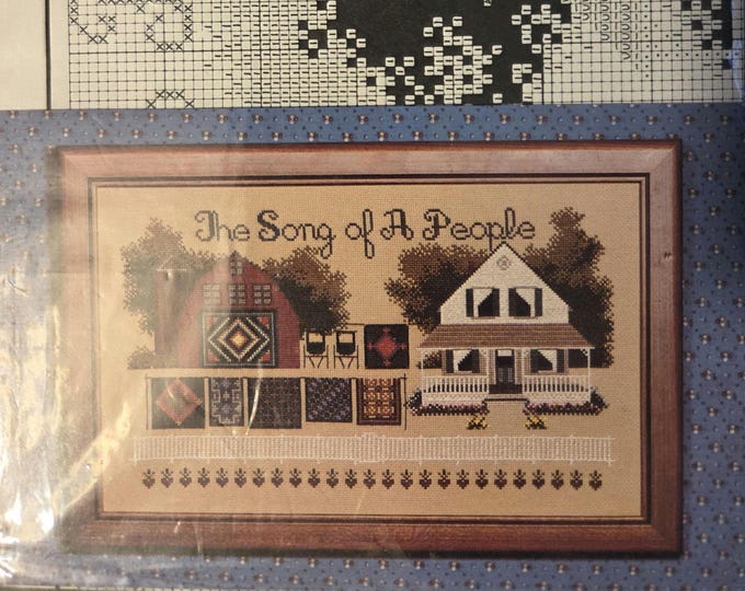 Told In A Garden The Song of a People Cross Stitch Pattern. Used Pattern repackaged in a polybag. Free Shipping.