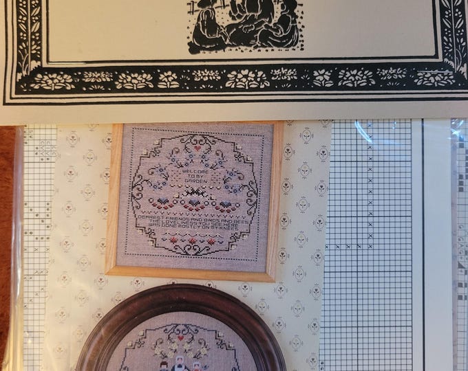 Told In A Garden Baby Garden Cross Stitch Pattern. Good Condition. Free Shipping.