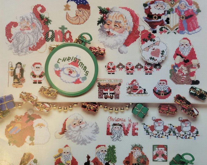 American School of Needlework 50 Santas Cross Stitch Pattern. Free Shipping. Used Condition