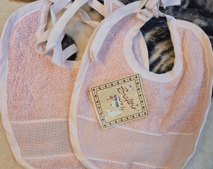 Pair of  Pink Bibs Newborn Size. Preowned Older Condition. FREE SHIPPING.