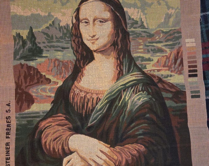 Royal Paris depicting Mona Lisa. Image is based on the famous painting by Leonardo da Vinci. Needlepoint Canvas 24x18 Vintage Preowned.