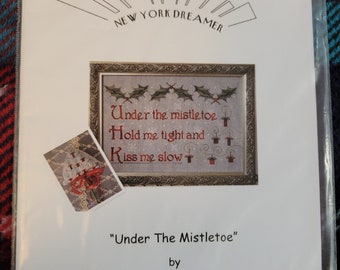 New York Dreamer Under The Mistletoe Cross Stitch Pattern. Good Condition. Free Shipping.