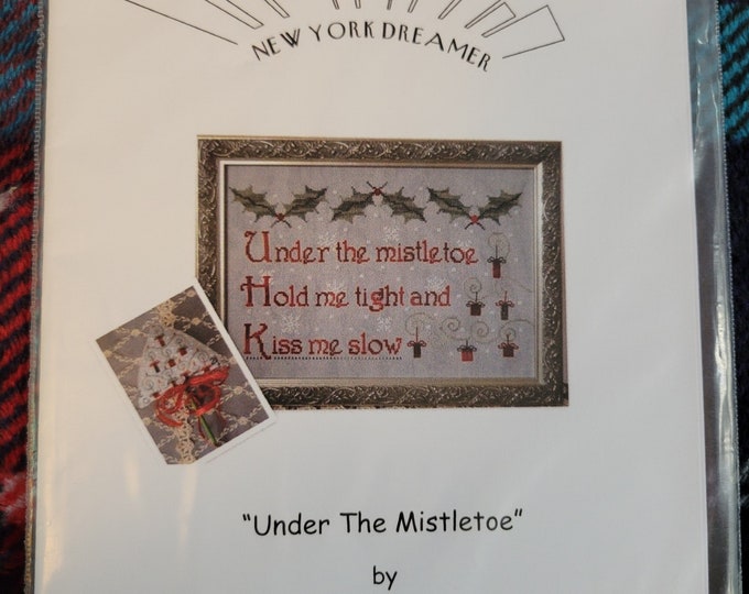 New York Dreamer Under The Mistletoe Cross Stitch Pattern. Good Condition. Free Shipping.