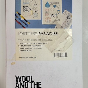 May include: A white rectangular embroidery kit package titled KNITTERS PARADISE by WOOL AND THE GANG. It features illustrations of knitting supplies, six skeins of thread, two sheets of magic paper, a stitch guide, and a sewing needle.
