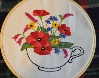 Flowers in a Teacup Handmade Embroidered Picture in 6inch Hoop with Felt Backing. Free Shipping. Some glue markings on back.