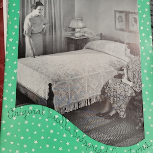 May include: A vintage magazine cover featuring a crocheted bedspread in a bedroom setting. The cover features the text "Original Bucilla Bedspread Creations" and "Vol. 76".