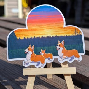 Entzückende Corgis-Familie bei Sonnenuntergang Vinyl-Aufkleber - Süßer Hundeaufkleber für Laptops, Wasserflaschen und mehr