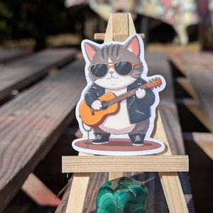 Coole Gitarristin Sticker - Rock 'n' Roll Kitty mit Sonnenbrille und Lederjacke