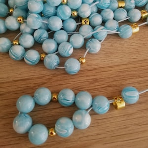 Mini Komboloi bomboniere con croce Battesimo ringraziamento ospiti regali souvenir matrimonio