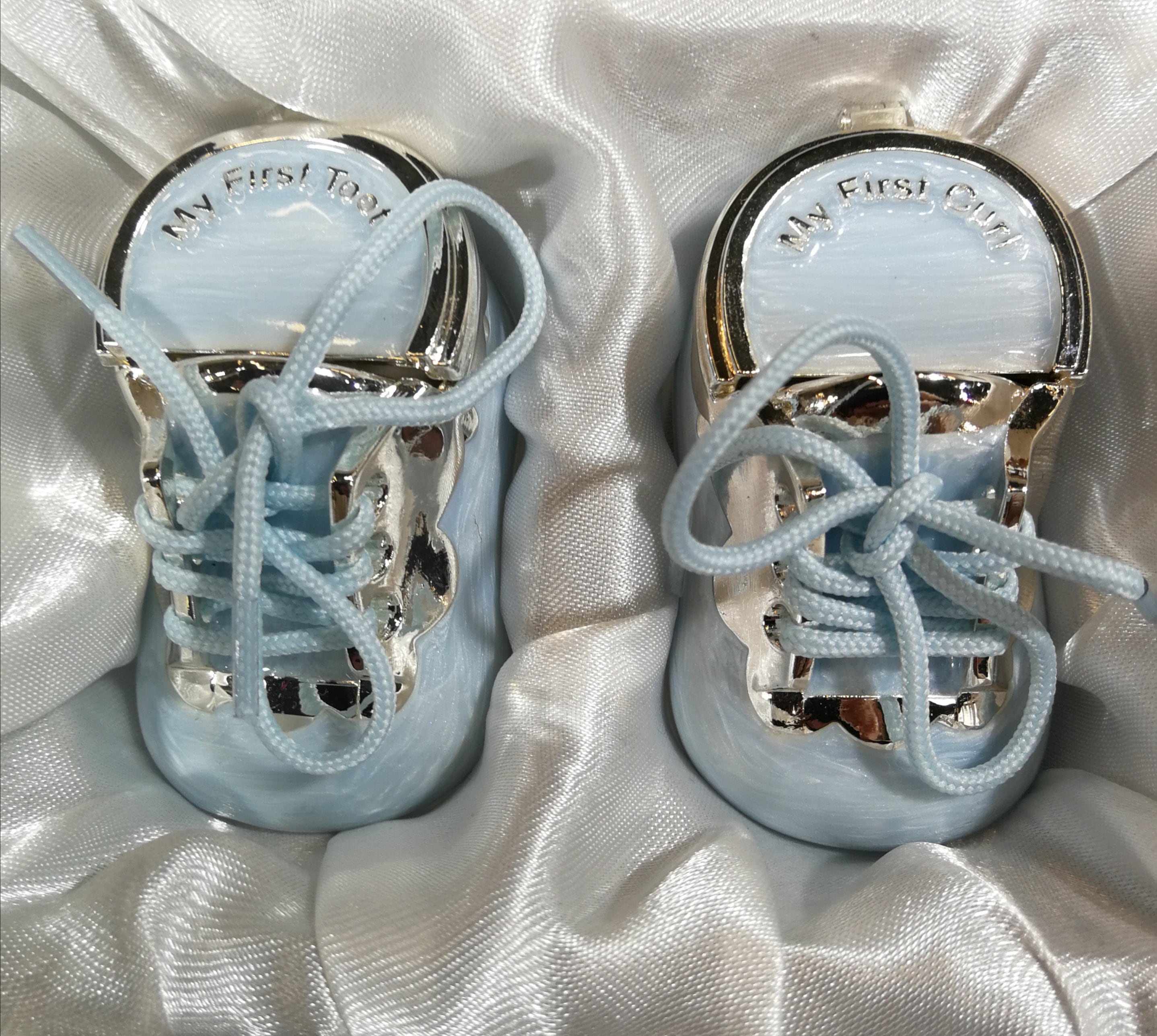 first tooth silver plated baby shoes