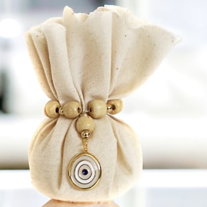 Bomboniere ecologiche per bambini, bomboniere anti-malocchio, bomboniere greche, bomboniere koufeta, eleganti regali per gli ospiti.