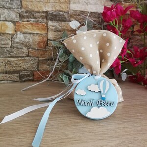 Bomboniere con mongolfiere, decorazioni personalizzate in ceramica, souvenir greci con koufeta, regali per gli ospiti del battesimo, omaggio di sacchetti