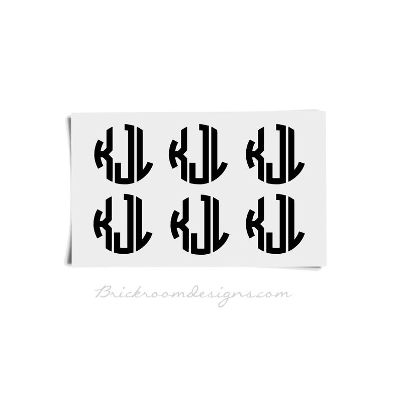 May include: Six black and white monogram stickers with the letters "KJL" in a circle.