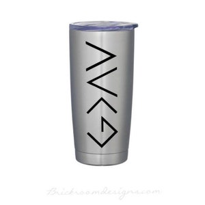 May include: A silver stainless steel tumbler with a black graphic of the Christian symbol "I am with you always" on the side.