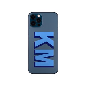 May include: A dark blue phone case with a blue and dark blue "KIM" design.