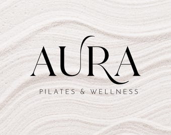 May include: AURA PILATES & WELLNESS logo in black text on a white background with a wavy texture.