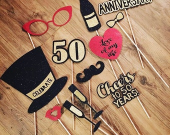 50th anniversary photoprops, certerpieces, and cake topper! Gold and black glitter cardstock, customized for you!