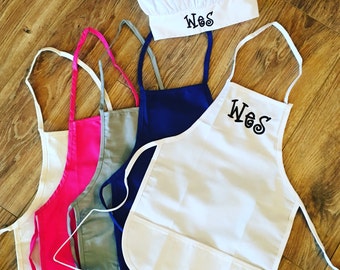 Kids aprons and chefs hats! Embroidered name or monogram make it so cute and a great gift for the kittle helper! Aprons great for artists 2!