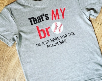 Thats my bro and I'm just here for the snack bar shirt! ;-) So cute for a little sibling that has to go to the baseball field all the time!