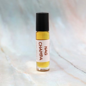 NAG CHAMPA Natural Perfume Roll On with Patchouli, Sandalwood, Champaca Essential Oils, All Natural, Alcohol Free .33 oz.