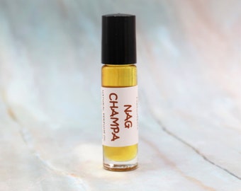 NAG CHAMPA Natural Perfume Roll On with Patchouli, Sandalwood, Champaca Essential Oils, All Natural, Alcohol Free .33 oz.