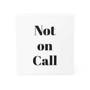 May include: White cube with the text "Not on Call" in black bold font.