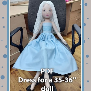 May include: PDF pattern for a dress for a 35-36 inch doll. The dress is light blue and the doll has white curly hair.