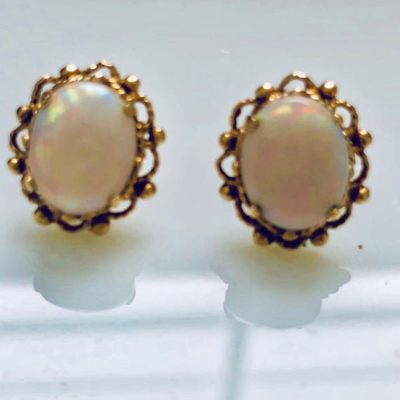Opal earrings|Opal stud earrings in 14k yellow gol