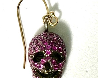 Ruby skulls set in Blackened Sterling Silver on 14k Gold Ear Hoops.