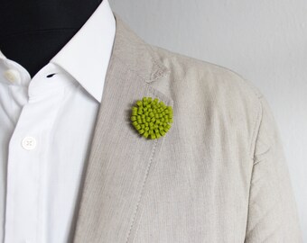 Boutonnière homme. Fleur. Feutre.