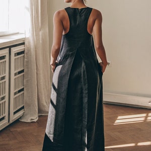 Long and soft, this maxi dress is made of organic linen that is breathable and pleasant to your body. The elongated cut and the pleat at the back create a beautiful silhouette that will turn heads everywhere you go.