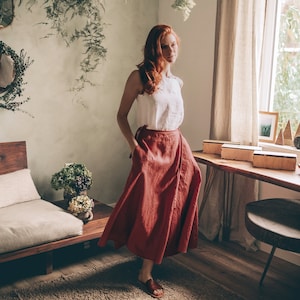 Effortless long linen skirt that is made of 100% pure linen and has a tie wrap closure and pockets. This rich maxi skirt looks feminine while being super comfy and breezy.