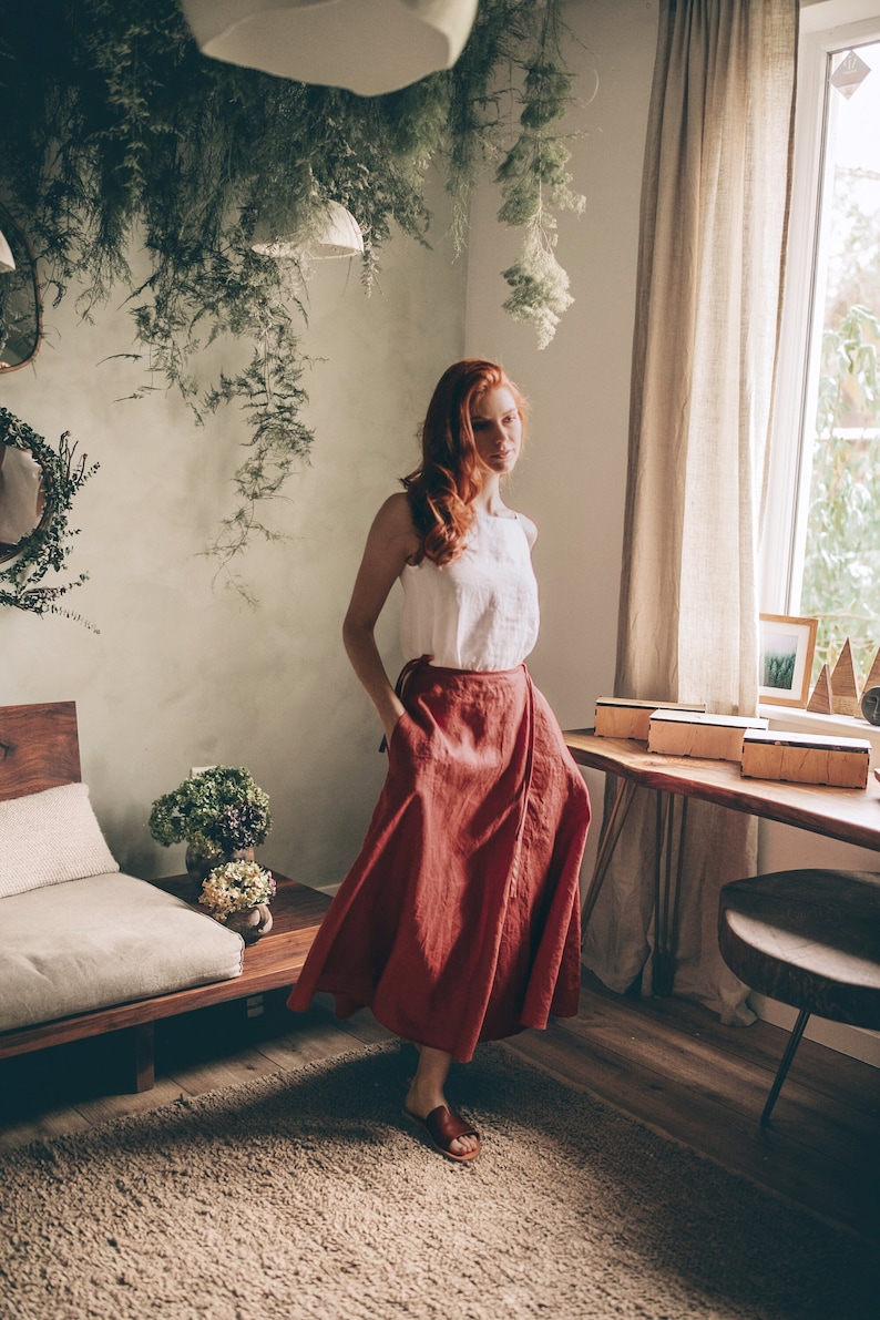 Effortless long linen skirt that is made of 100% pure linen and has a tie wrap closure and pockets. This rich maxi skirt looks feminine while being super comfy and breezy.