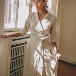Timeless elegance in its most graceful form. We would like to present you this A-line wrap linen dress with an elegant tie waist and a V-neck collar. Made of 100% high quality linen