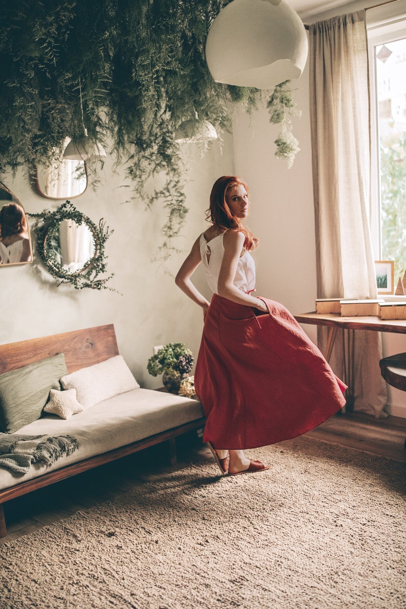Effortless long linen skirt that is made of 100% pure linen and has a tie wrap closure and pockets. This rich maxi skirt looks feminine while being super comfy and breezy.