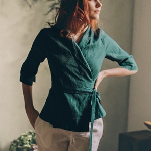 This linen wrap top looks perfect paired with both linen bottom or jeans. Featuring elbow length sleeves, a shawl neckline and a tie belt . This piece will become a favorite in your summer wardrobe for its easiness, beauty and practicality.