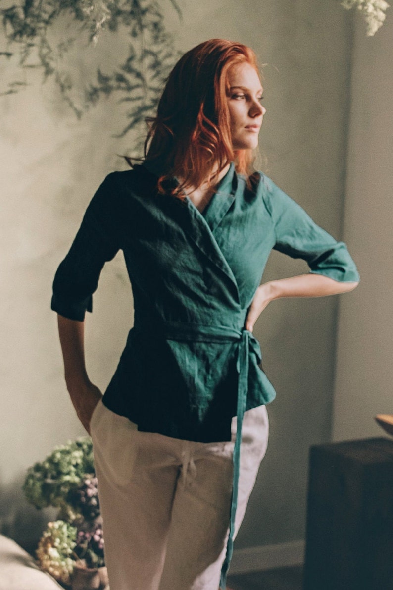 This linen wrap top looks perfect paired with both linen bottom or jeans. Featuring elbow length sleeves, a shawl neckline and a tie belt . This piece will become a favorite in your summer wardrobe for its easiness, beauty and practicality.