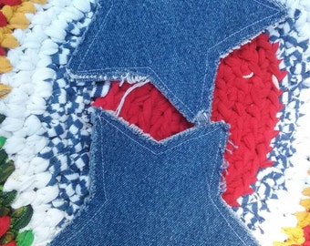A pair of Denim star coasters made from recycled jeans repurposed reused