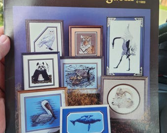 Vintage 1989 Cross My Heart "Our Wild Kingdom" Counted Cross Stitch booklet. 9 patterns. Owl, Panda, Heron, Tiger and more.