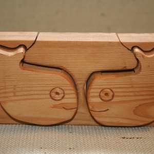 Whale boxes in reclaimed pine. This is one example. I can customize to any size and any number of whales.
