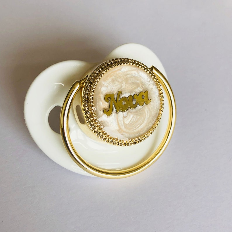 gold baby pacifier