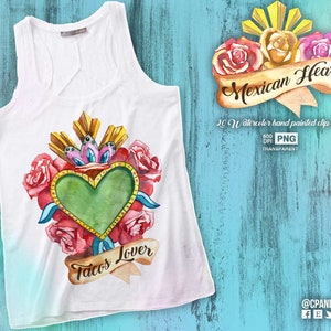 Puede incluir: Una camiseta sin mangas blanca con una ilustraci&oacute;n de acuarela de un coraz&oacute;n verde con flores rojas y amarillas y el texto "Tacos Lover" en una cinta marr&oacute;n. La ilustraci&oacute;n est&aacute; rodeada por un halo amarillo con una cinta marr&oacute;n que dice "Mexican Heart".