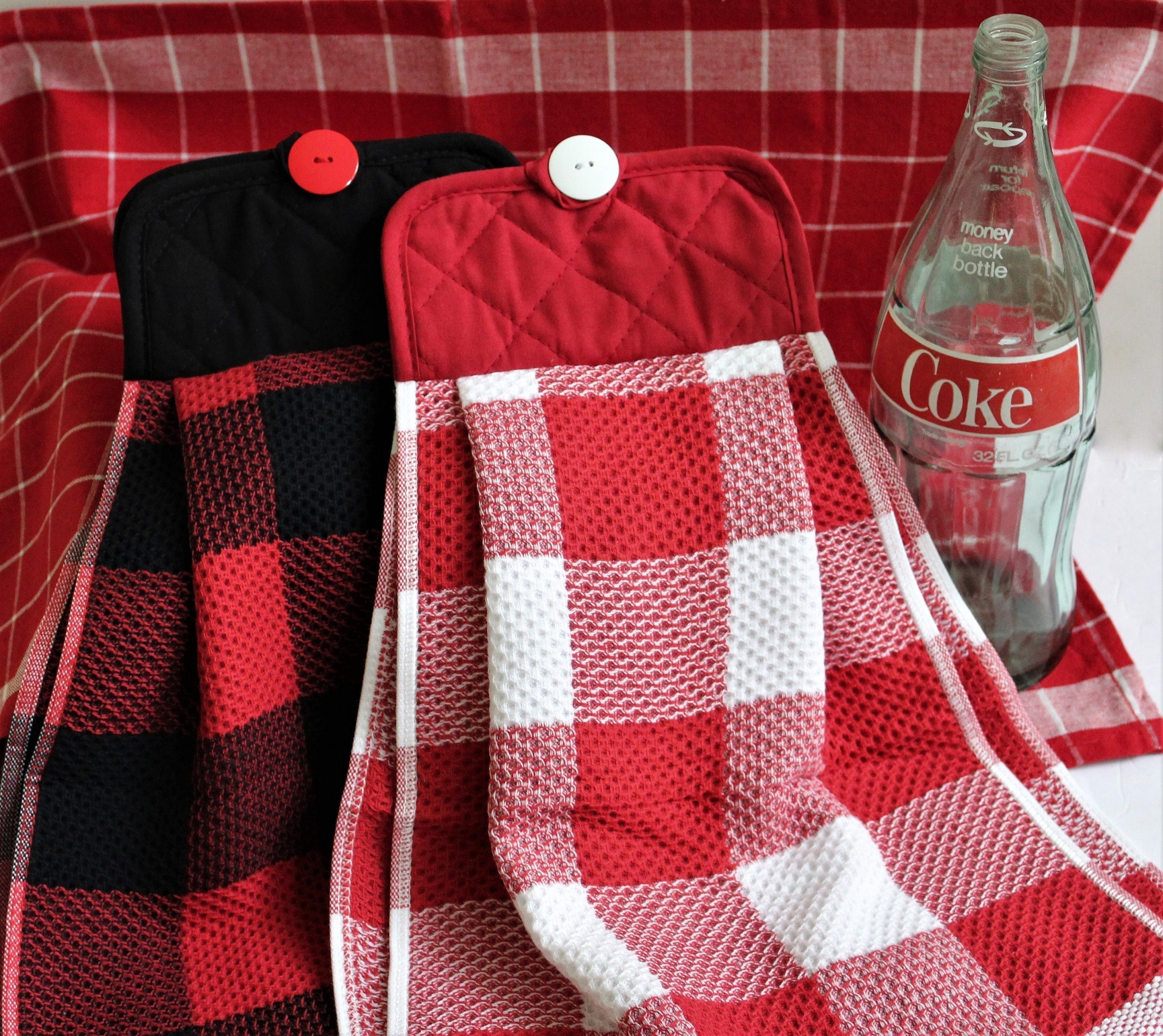 Red checked towel with fancy lace.