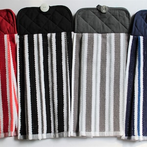 May include: Four striped kitchen towels with matching pot holders. The towels are red and white, black and white, gray and white, and blue and white.