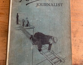 May include: A blue book with the title "Psmith Journalist" on the cover. The cover features a black and white illustration of a man climbing a ladder.