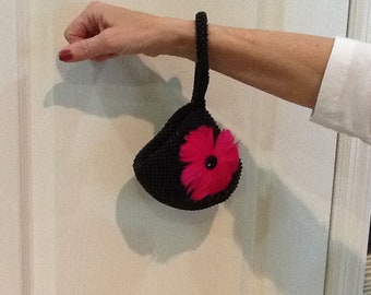 Black Beaded Wristlet Purse with Hot Pink Feather Flower on Front of Bag.